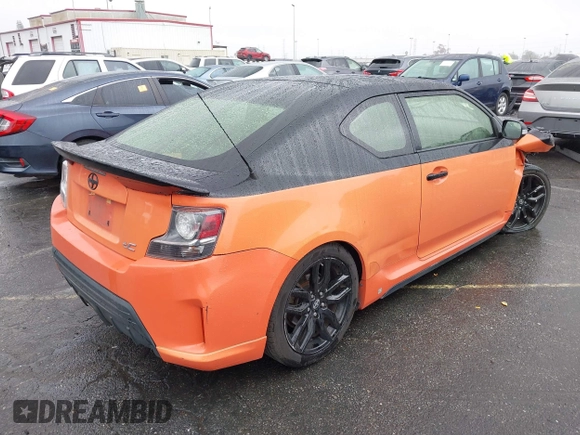 2015 Scion tC with VIN JTKJF5C79FJ007842, listed as a IAAI auction lot 41560881 with 155,436 mi miles. Bid and sale history available at carsss.com. Image 4.