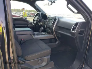 2015 Ford F-150 XLT with VIN 1FTEW1EG3FKE16010, listed as a IAAI auction lot 42107938 with 242,625 mi miles and . Bid and sale history available at DreamBid. Image 5.