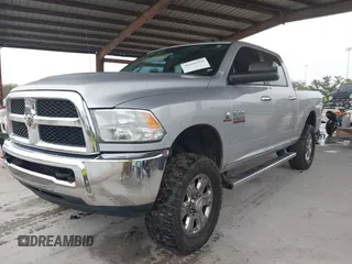 2018 Ram 2500 Big Horn with VIN 3C6UR5DL7JG215873, listed as a IAAI auction lot 41656764 with 142,129 mi miles. Bid and sale history available at carsss.com. Image 2.