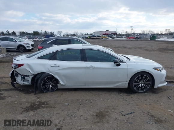 2019 Toyota Avalon XLE with VIN 4T1BZ1FB5KU014903, listed as a IAAI auction lot 41388692 with 100,599 mi miles. Bid and sale history available at carsss.com. Image 13.