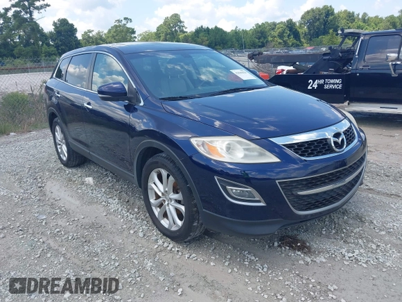 2012 Mazda CX-9 Grand Touring z VIN JM3TB2DA8C0367519, wystawiony jako IAAI lot #42846020 z przebiegiem 174 636 mil mil oraz . Historia ofert i sprzedaży dostępna na DreamBid. Obrazek 1.