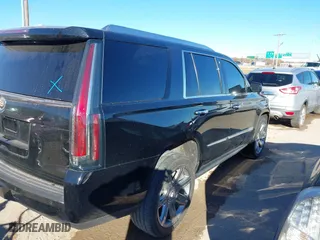 2015 Cadillac Escalade Premium with VIN 1GYS4CKJ0FR180180, listed as a IAAI auction lot 41054933 with 146,974 mi miles. Bid and sale history available at carsss.com. Image 4.