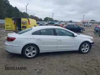 2016 Volkswagen CC Sport with VIN WVWBN7AN4GE512547, listed as a IAAI auction lot 40802001 with 94,513 mi miles. Bid and sale history available at carsss.com. Image 14.