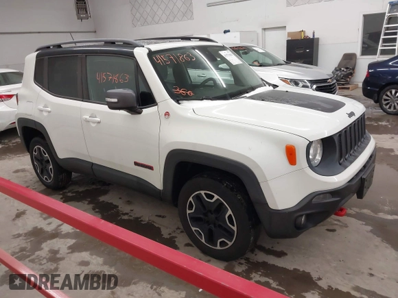 2015 Jeep Renegade Trailhawk with VIN ZACCJBCT2FPC33277, listed as a IAAI auction lot 41571863 with 98,912 mi miles and . Bid and sale history available at DreamBid. Image 1.