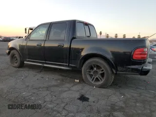 2002 Ford F-150 Harley Davidson with VIN 1FTRW07332KE10689, listed as a Copart auction lot 88341885 with 0 mi miles and Salvage Title. Bid and sale history available at carsss.com. Image 2.