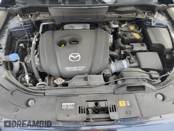 2018 Mazda CX-5 Touring with VIN JM3KFBCM5J0443383, listed as a Copart auction lot 47799095 with 39,814 mi miles and Salvage Title. Bid and sale history available at DreamBid. Image 12.
