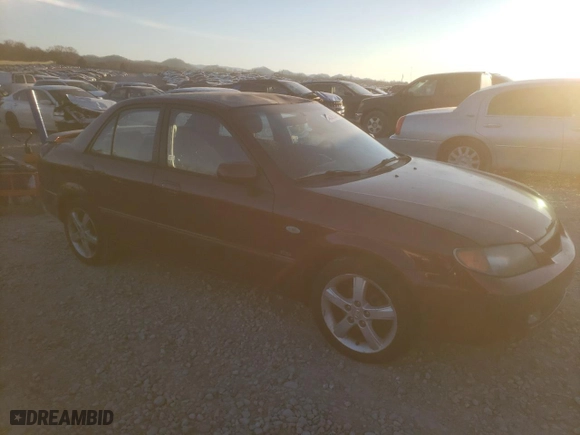 2003 Mazda Protege DX with VIN JM1BJ226130116010, listed as a Copart auction lot 86257204 with 227,074 mi miles and Clean Title. Bid and sale history available at carsss.com. Image 4.