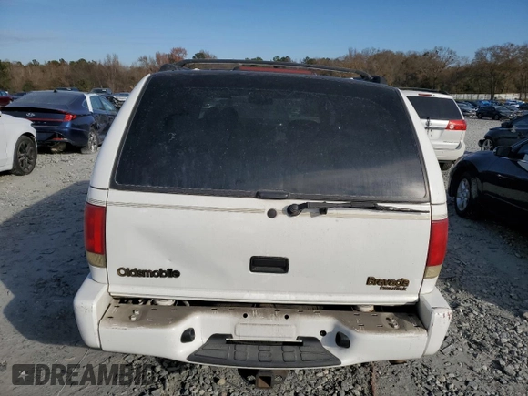 1999 Oldsmobile Bravada z VIN 1GHDT13W8X2717155, wystawiony jako Copart lot #84807244 z przebiegiem 144 805 mil mil oraz Szkoda całkowita • Salvage title. Historia ofert i sprzedaży dostępna na DreamBid. Obrazek 6.