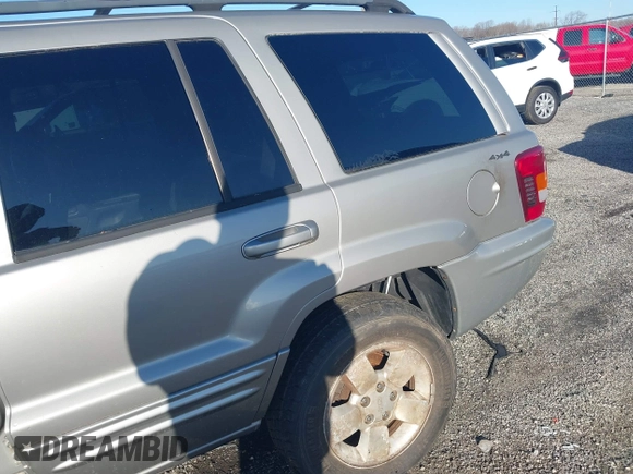 2001 Jeep Grand Cherokee Limited with VIN 1J4GW58N11C650606, listed as a IAAI auction lot 41722256 with 1 mi miles. Bid and sale history available at carsss.com. Image 6.