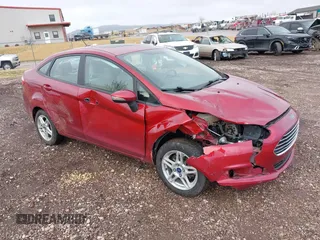 2017 Ford Fiesta SE z VIN 3FADP4BJ6HM167889, wystawiony jako IAAI lot #41948144 z przebiegiem 106 262 mil mil oraz . Historia ofert i sprzedaży dostępna na DreamBid. Obrazek 1.