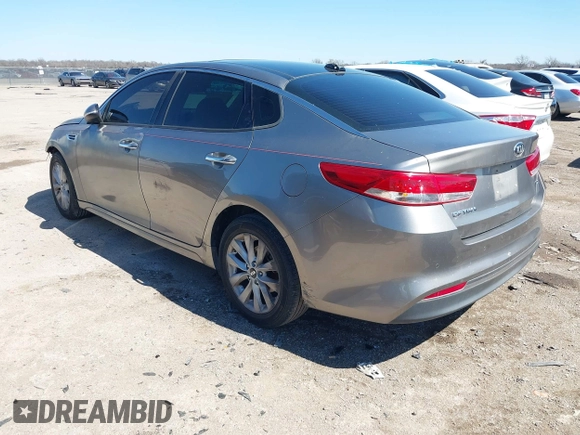 2016 Kia Optima EX with VIN 5XXGU4L31GG106854, listed as a IAAI auction lot 41762052 with 122,121 mi miles. Bid and sale history available at carsss.com. Image 3.