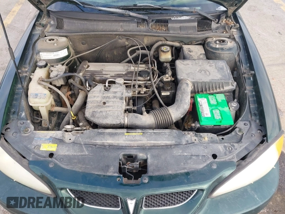 2002 Pontiac Grand Am SE1 z VIN 1G2NF52FX2C165546, wystawiony jako IAAI lot #41290065 z przebiegiem 149 834 mil mil oraz . Historia ofert i sprzedaży dostępna na DreamBid. Obrazek 10.