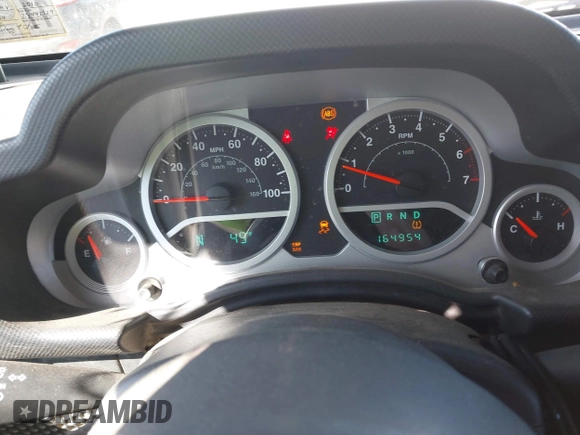 2010 Jeep Wrangler Sport with VIN 1J4GA2D11AL161770, listed as a IAAI auction lot 41875929 with 164,954 mi miles and . Bid and sale history available at carsss.com. Image 7.