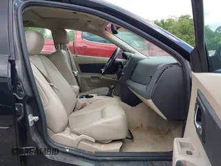2004 Cadillac CTS z VIN 1G6DM577X40125926, wystawiony jako IAAI lot #42363599 z przebiegiem 187 600 mil mil oraz . Historia ofert i sprzedaży dostępna na DreamBid. Obrazek 5.