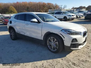 2021 BMW X2 xDrive28i with VIN WBXYJ1C00M5S24107, listed as a Copart auction lot 81824504 with 29,376 mi miles and Salvage Title. Bid and sale history available at carsss.com. Image 4.