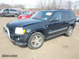 2006 Jeep Grand Cherokee Laredo with VIN 1J4HR48N76C265919, listed as a IAAI auction lot 41738435 with 133,286 mi miles. Bid and sale history available at carsss.com. Image 2.