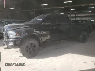 2014 Ram 3500 Laramie with VIN 3C63R3JL9EG258069, listed as a Copart auction lot 71571664 with 104,983 mi miles and Salvage Title. Bid and sale history available at carsss.com. Image 1.