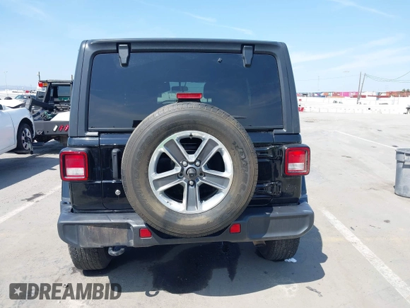 2020 Jeep Wrangler Unlimited Sahara with VIN 1C4HJXEN6LW235159, listed as a IAAI auction lot 42045083 with 68,400 mi miles and . Bid and sale history available at DreamBid. Image 16.
