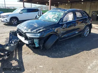 2015 Audi Q3 2.0T Premium Plus with VIN WA1EFCFS4FR001441, listed as a IAAI auction lot 41813239 with 112,795 mi miles. Bid and sale history available at carsss.com. Image 2.