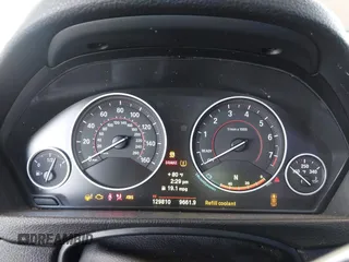 2014 BMW 4 Series 428i with VIN WBA3N7C51EK220125, listed as a IAAI auction lot 41881928 with 129,810 mi miles and . Bid and sale history available at carsss.com. Image 7.
