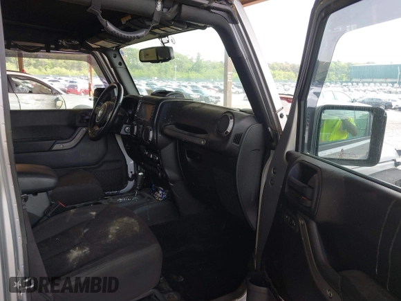 2017 Jeep Wrangler Unlimited Sport with VIN 1C4BJWDG1HL591515, listed as a IAAI auction lot 42426201 with 124,131 mi miles and . Bid and sale history available at DreamBid. Image 5.