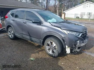 2019 Honda CR-V LX with VIN 5J6RW6H34KL005317, listed as a IAAI auction lot 41225711 with 59,166 mi miles. Bid and sale history available at carsss.com. Image 1.