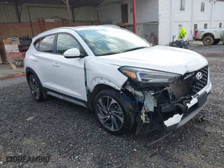 2020 Hyundai Tucson SEL with VIN KM8J3CAL5LU231183, listed as a IAAI auction lot 41509330 with 127,440 mi miles. Bid and sale history available at carsss.com. Image 1.