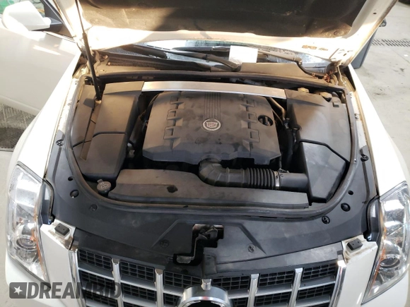 2013 Cadillac CTS Premium z VIN 1G6DS5E3XD0101681, wystawiony jako Copart lot #41334385 z przebiegiem 49 646 mil mil oraz Szkoda całkowita • Salvage title. Historia ofert i sprzedaży dostępna na DreamBid. Obrazek 13.