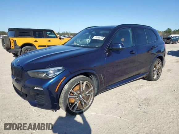2021 BMW X5 M50i with VIN 5UXJU4C06M9F06155, listed as a Copart auction lot 86296724 with 59,608 mi miles and Salvage Title. Bid and sale history available at carsss.com. Image 1.