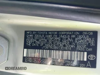 2009 Toyota Yaris with VIN JTDBT903891307874, listed as a IAAI auction lot 42150366 with 218,350 mi miles. Bid and sale history available at carsss.com. Image 9.
