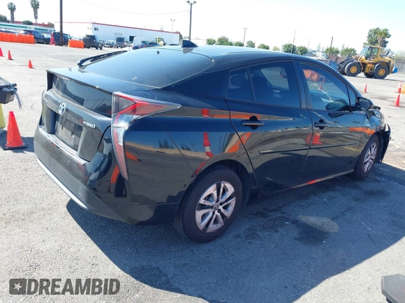 2018 Toyota Prius Two with VIN JTDKBRFU9J3061915, listed as a IAAI auction lot 41840107 with 62,782 mi miles and . Bid and sale history available at carsss.com. Image 4.