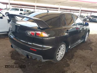 2013 Mitsubishi Lancer Evolution GSR with VIN JA32W8FV6DU009257, listed as a IAAI auction lot 41917942 with 125,279 mi miles. Bid and sale history available at carsss.com. Image 4.