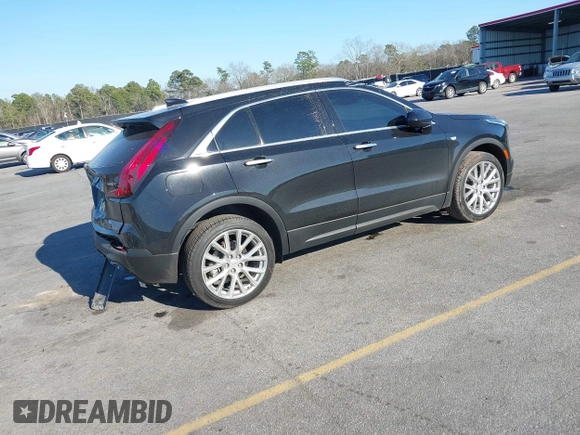 2021 Cadillac XT4 FWD Luxury with VIN 1GYAZAR46MF074767, listed as a IAAI auction lot 41652091 with 46,631 mi miles and . Bid and sale history available at DreamBid. Image 4.