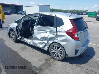 2015 Honda Fit EX-L z VIN 3HGGK5H82FM727678, wystawiony jako IAAI lot #42451860 z przebiegiem 102 512 mil mil oraz . Historia ofert i sprzedaży dostępna na DreamBid. Obrazek 3.
