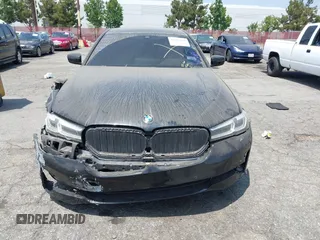2021 BMW 5 Series 530i z VIN WBA53BH01MCF65097, wystawiony jako IAAI lot #42783119 z przebiegiem 91 829 mil mil oraz . Historia ofert i sprzedaży dostępna na DreamBid. Obrazek 13.