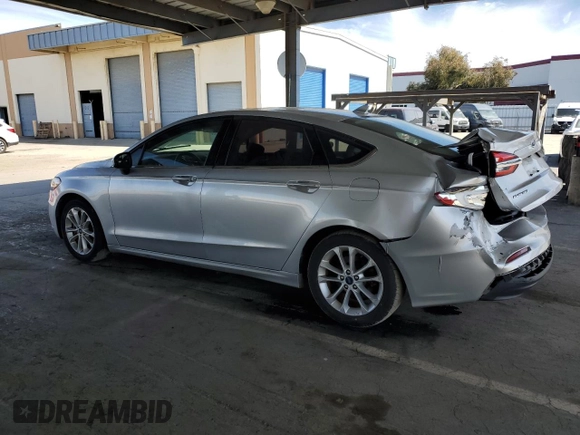 2019 Ford Fusion Hybrid SE with VIN 3FA6P0LU7KR262160, listed as a Copart auction lot 51969555 with 99,699 mi miles and Salvage Title. Bid and sale history available at carsss.com. Image 2.