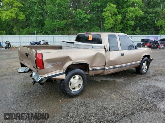 1994 GMC Sierra 1500 z VIN 2GTEK19K3R1574913, wystawiony jako Copart lot #55939635 z przebiegiem 191 240 mil mil oraz Szkoda całkowita • Salvage title. Historia ofert i sprzedaży dostępna na DreamBid. Obrazek 3.