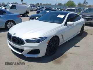 2022 BMW 8 Series M850i z VIN WBAGV8C02NCH87808, wystawiony jako IAAI lot #42255995 z przebiegiem 34 285 mil mil oraz . Historia ofert i sprzedaży dostępna na DreamBid. Obrazek 18.