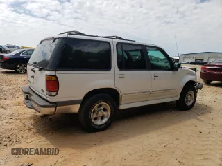 1997 Ford Explorer XL with VIN 1FMDU32E8VUC60285, listed as a Copart auction lot 66154644 with 219,066 mi miles and Salvage title. Bid and sale history available at DreamBid. Image 3.