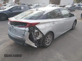 2017 Toyota Prius Plus with VIN JTDKARFP6H3039054, listed as a IAAI auction lot 41665195 with 233,161 mi miles and . Bid and sale history available at DreamBid. Image 4.
