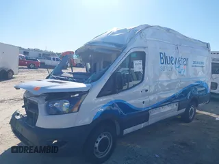 2022 Ford Transit Cargo with VIN 1FTBR3X81NKA63860, listed as a IAAI auction lot 42323904 with 94,473 mi miles and . Bid and sale history available at DreamBid. Image 2.