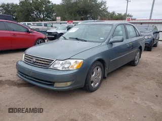 2004 Toyota Avalon XL with VIN 4T1BF28B84U370390, listed as a IAAI auction lot 41351151 with 242,910 mi miles and . Bid and sale history available at DreamBid. Image 2.