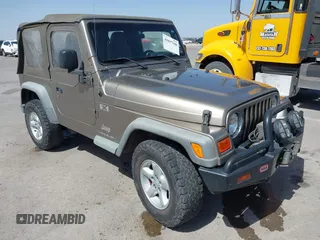 2003 Jeep Wrangler X with VIN 1J4FA39S03P312550, listed as a IAAI auction lot 41837150 with 127,239 mi miles and . Bid and sale history available at DreamBid. Image 1.
