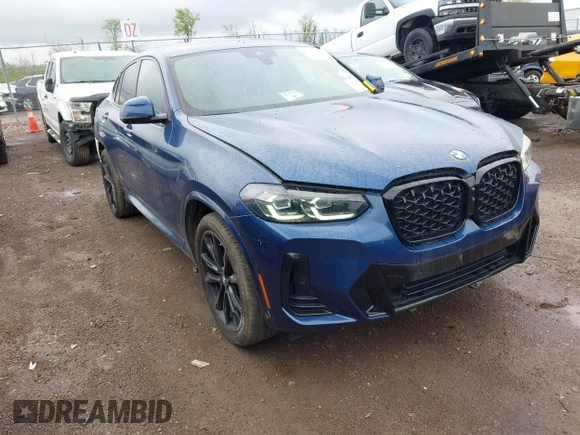 2023 BMW X4 xDrive30i z VIN 5UX33DT01P9P86340, wystawiony jako IAAI lot #42113558 z przebiegiem 27 226 mil mil oraz . Historia ofert i sprzedaży dostępna na DreamBid. Obrazek 1.