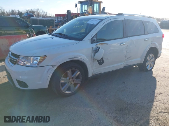 2013 Dodge Journey Crew with VIN 3C4PDCDG3DT521556, listed as a IAAI auction lot 41852888 with 209,562 mi miles and . Bid and sale history available at DreamBid. Image 2.