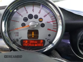 2009 MINI Hardtop S with VIN WMWMF73509TW86792, listed as a IAAI auction lot 41766406 with 174,724 mi miles and . Bid and sale history available at DreamBid. Image 7.