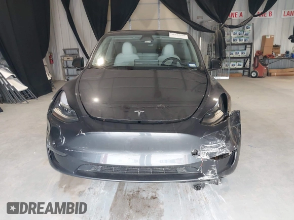 2024 Tesla Model Y Long Range z VIN 7SAYGDEEXRA226636, wystawiony jako IAAI lot #41622144 z przebiegiem 8 908 mil mil oraz . Historia ofert i sprzedaży dostępna na DreamBid. Obrazek 12.
