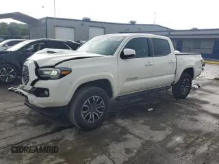 2020 Toyota Tacoma SR5 with VIN 3TMCZ5AN8LM323840, listed as a Copart auction lot 61076645 with 79,538 mi miles and Salvage title. Bid and sale history available at DreamBid. Image 1.