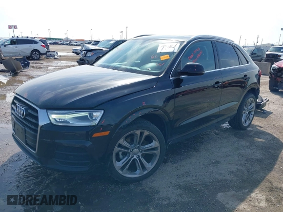 2016 Audi Q3 Premium Plus with VIN WA1EFCFS9GR018740, listed as a IAAI auction lot 41564117 with 38,303 mi miles. Bid and sale history available at carsss.com. Image 18.