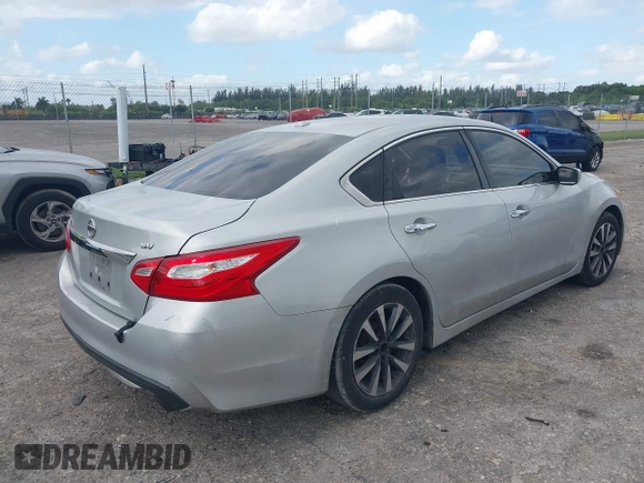 2017 Nissan Altima SV with VIN 1N4AL3AP7HC188945, listed as a IAAI auction lot 42111225 with 157,185 mi miles and . Bid and sale history available at carsss.com. Image 4.